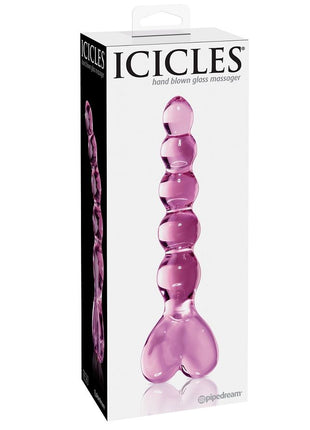 scatola di cartone contenente massaggiatore a sfere rosa con base a cuore e scritte nere